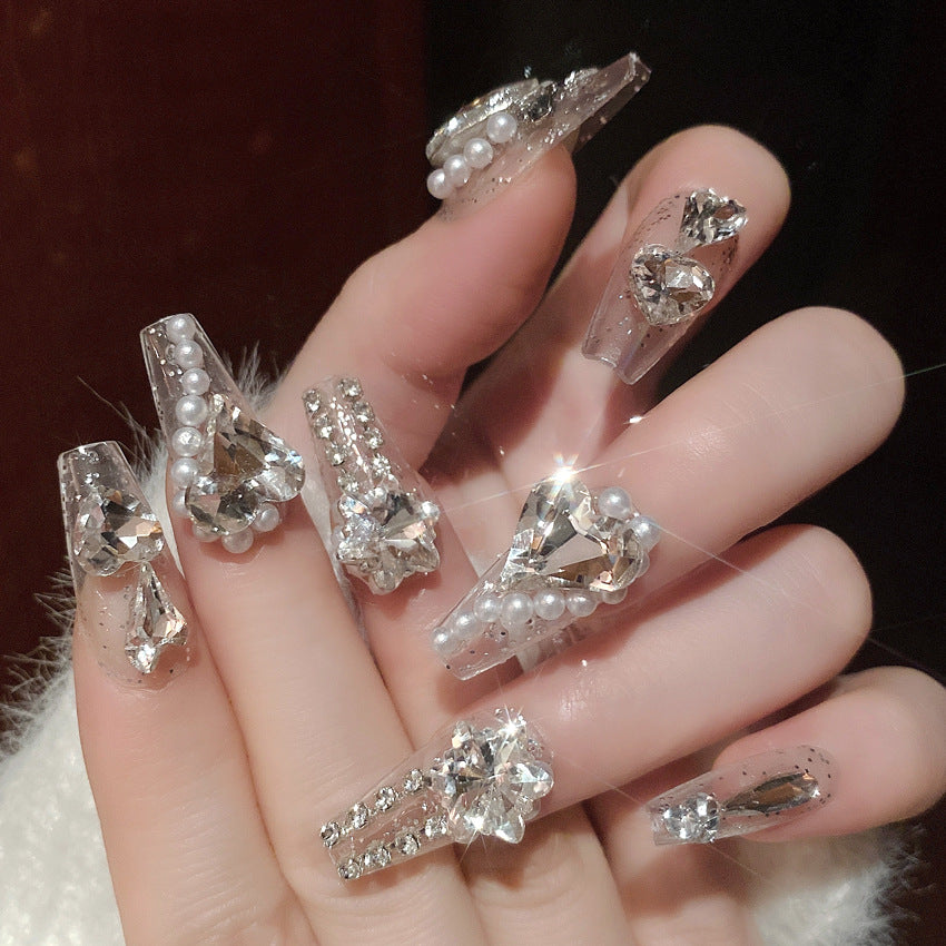 Dekorative, mit Kristallen verzierte Nagelspitzen Karnz