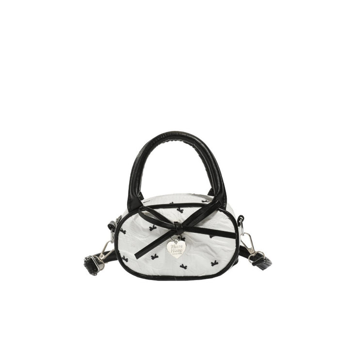Gepolsterte Mini-Handtasche mit Herzdetail Karnz