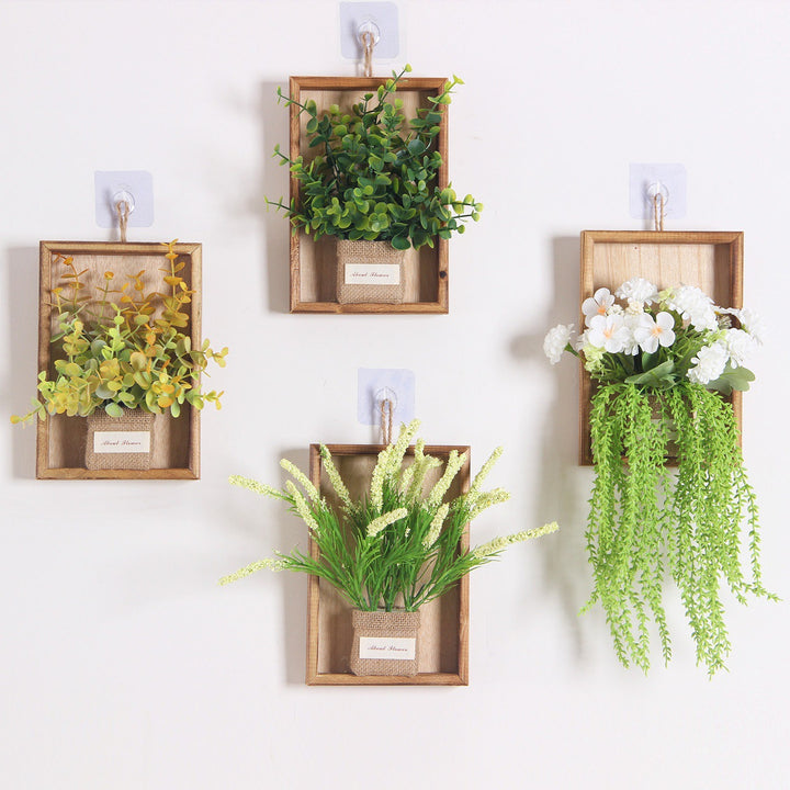 Wandmontierte dekorative florale hängende Pflanzgefäß