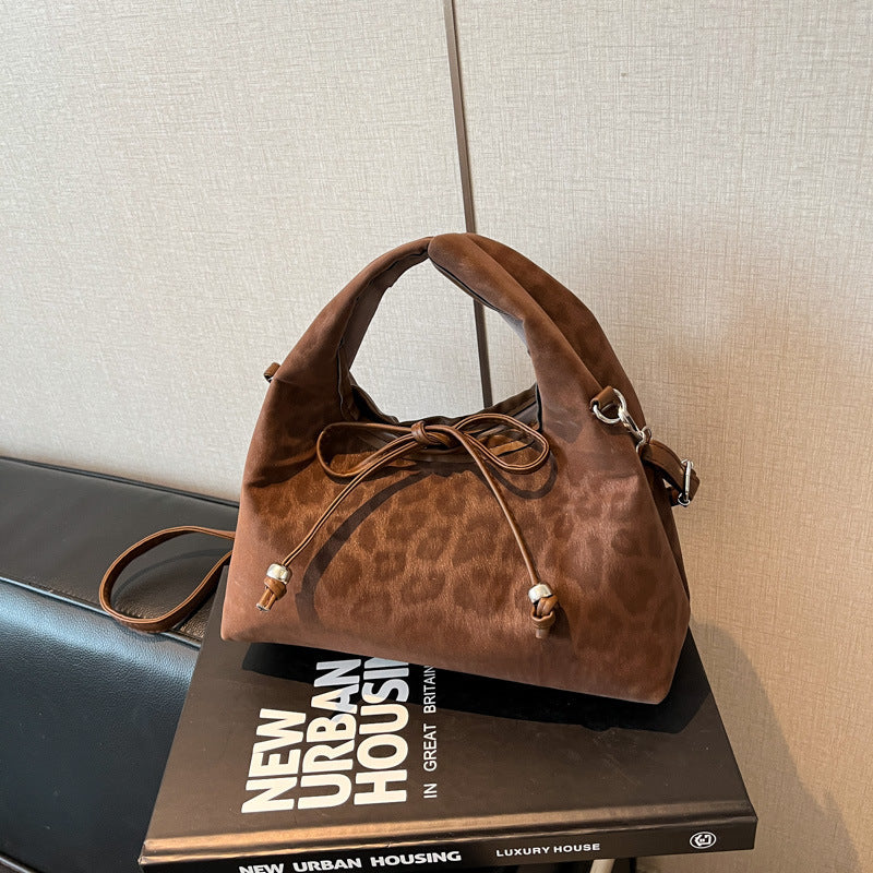Stylische und funktionale Drawstring-Handtasche Karnz