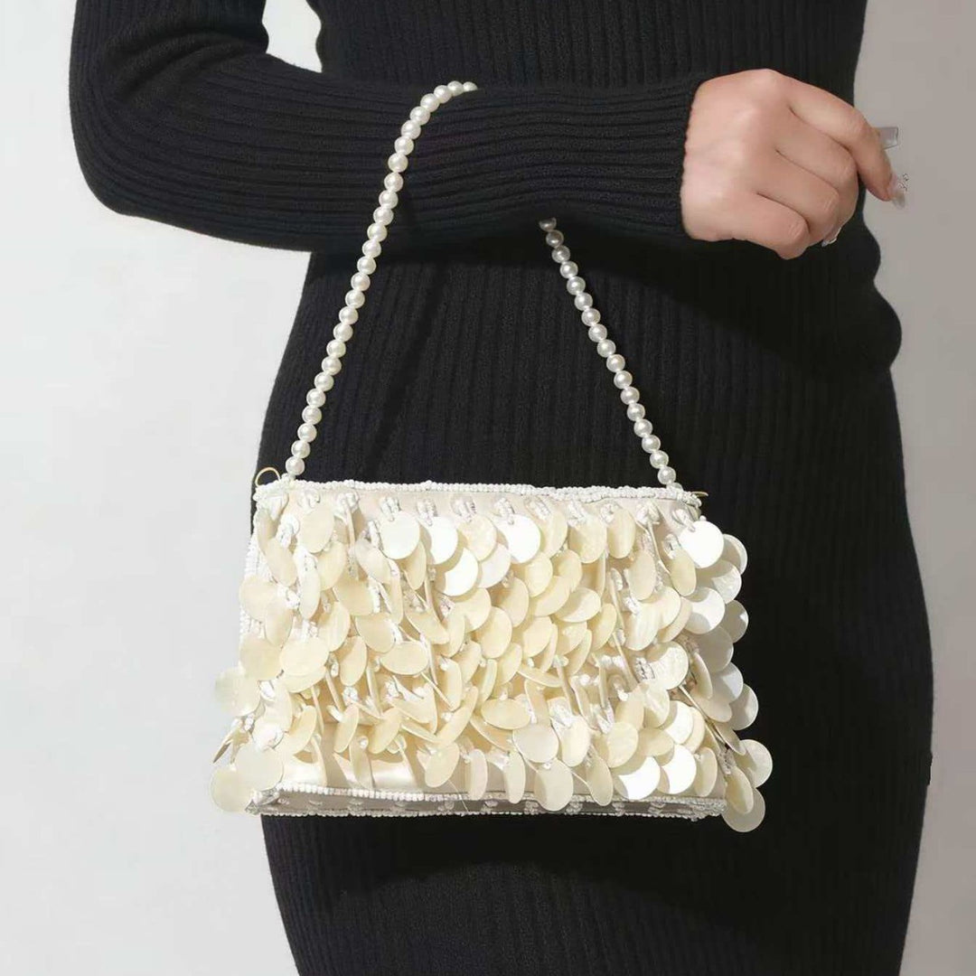 Dekorative Muschelfransen-Handtasche