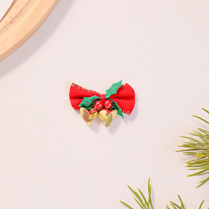 Festliche Haarschleife mit Glocken und Weihnachtsmotiv Karnz