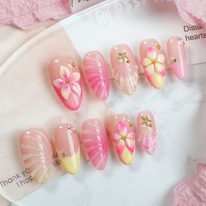 Kunstnagelset mit floralen Akzenten und Glitzerverzierungen Karnz 1789119239