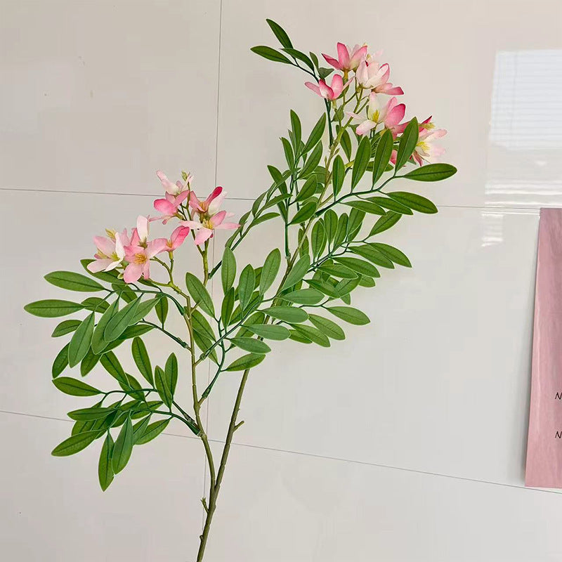 Dekorativer Kunstblütenzweig mit zarten Blüten Karnz