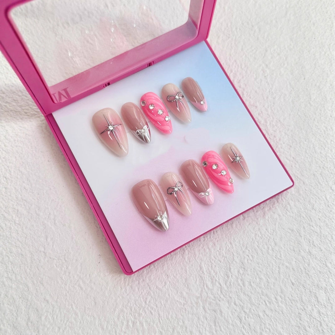 Luxuriöses Press-On-Nagelkunst-Set mit dekorativen Edelstein- und Schleifenakzenten