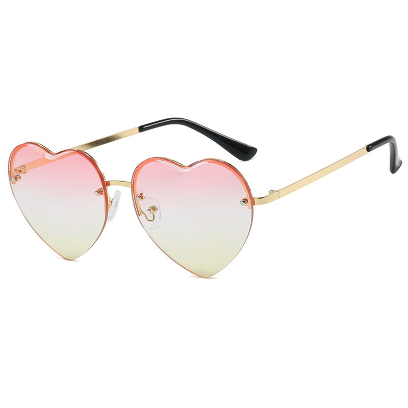 Damen Herzförmige Sonnenbrille mit verspiegelten Gläsern und modischem Metallrahmen Karnz