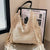 Damen Makramee Handtasche mit fransigen Details Karnz