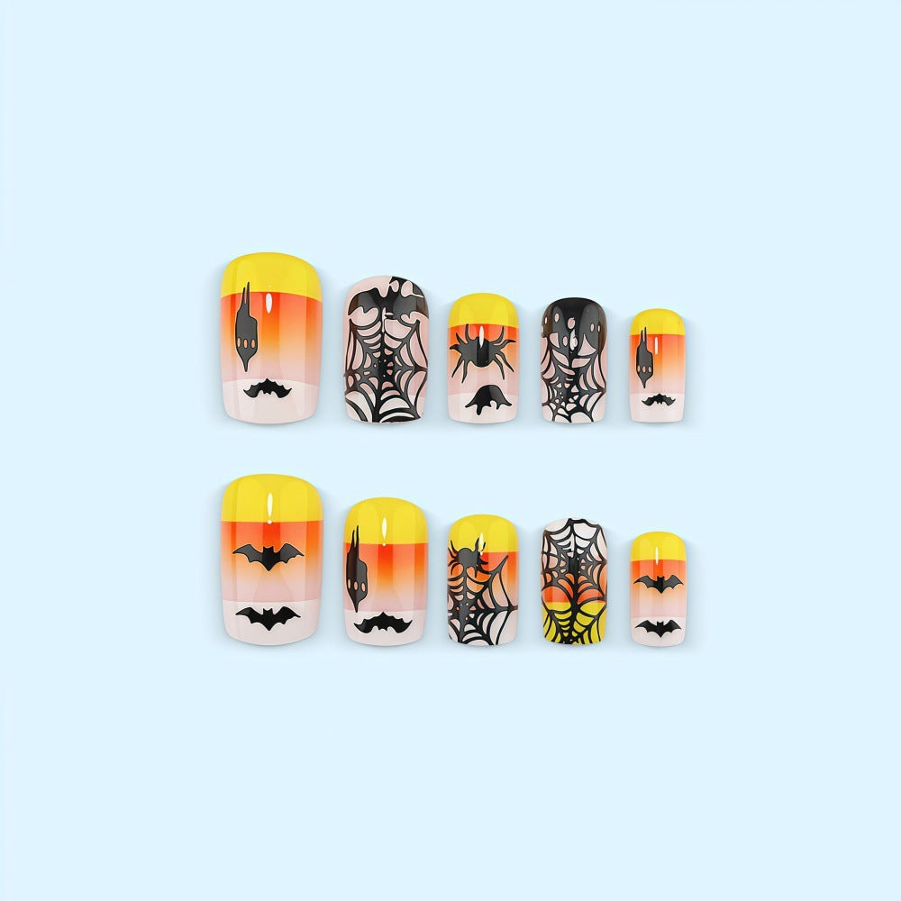 Kunstnägel im kreativen Halloween-Stil mit Spinnen- und Fledermausmotiven Karnz