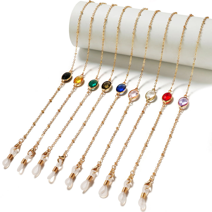Eleganter mit Edelsteinen verzierter Brillenhalter Karnz
