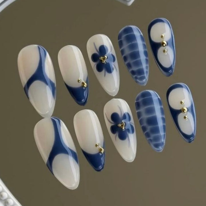 Künstlerisches Floral- und Stern-Applikationen Press-On Nagelset Karnz