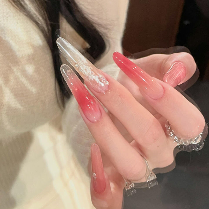 Kunstnagelset mit Elegantem Farbverlauf und Glitzerdetails Karnz