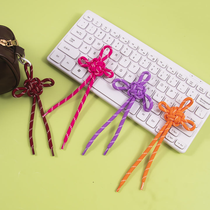 Dekoratives geknotetes Accessoire Karnz