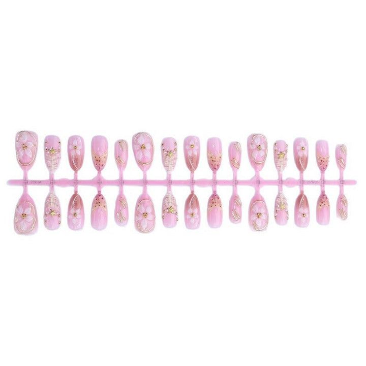 Kunstnagelset mit luxuriösen 3D-Blüten und edlen Akzenten Karnz