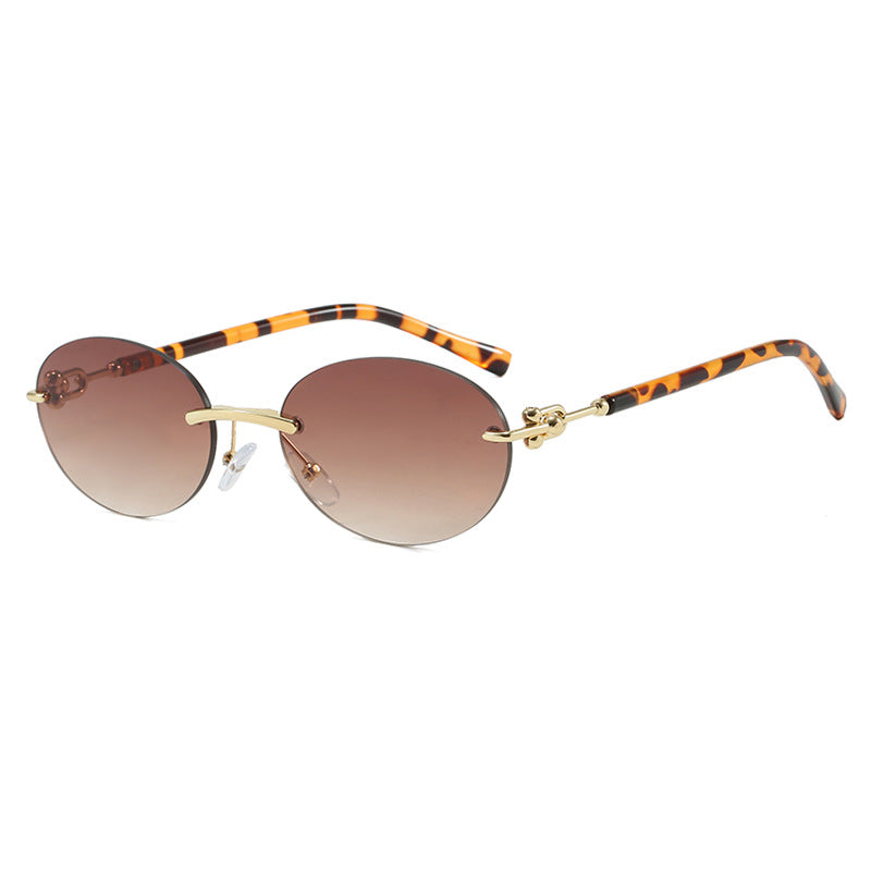 Damen ovale Sonnenbrille mit luxuriösem Metallrahmen und verspiegelten Gläsern Karnz