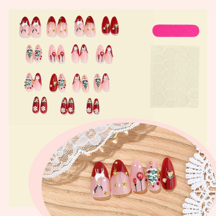 Kunstnagelset mit festlichen Motiven und Glitzerelementen Karnz