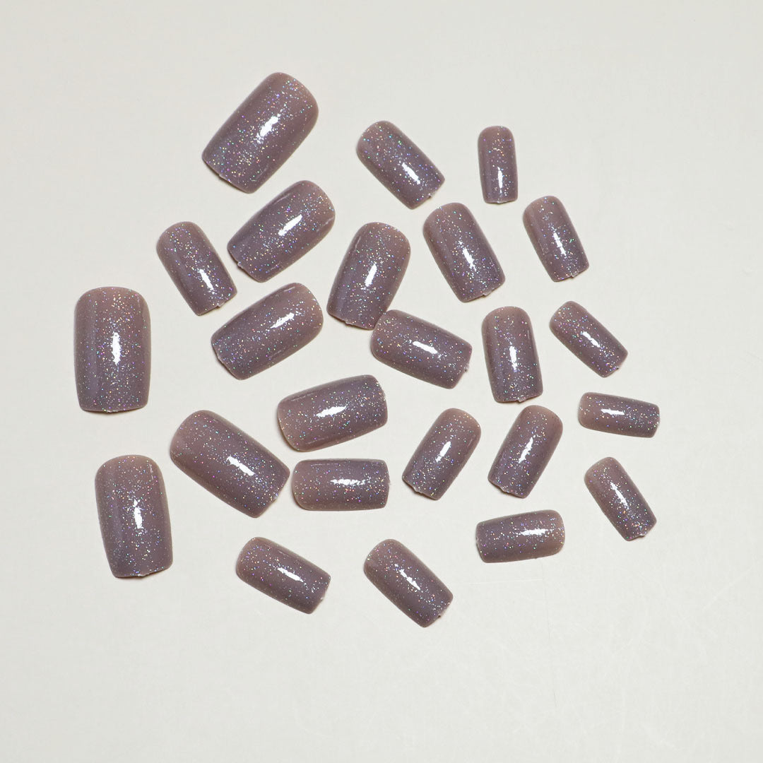 Glitzerhaltiges Press-On Nagelset Karnz