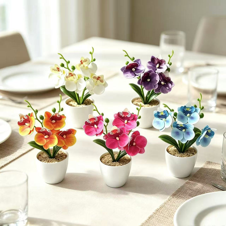 Elegante synthetische Orchideenarrangement