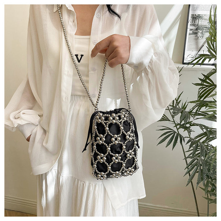 Elegante perlenverzierte Drawstring-Handtasche