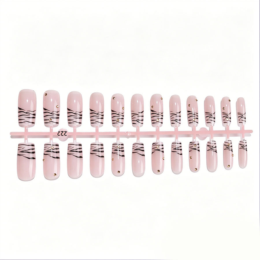 Kunstnagel-Set mit eleganten Linien und Glitzerakzenten Karnz