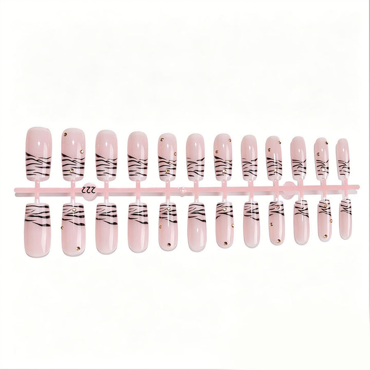Kunstnagel-Set mit eleganten Linien und Glitzerakzenten Karnz
