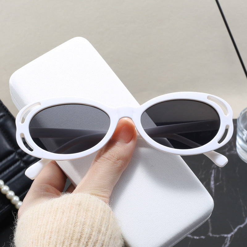 Damen modische Sonnenbrille mit ovalem Rahmen und einzigartigem Design Karnz