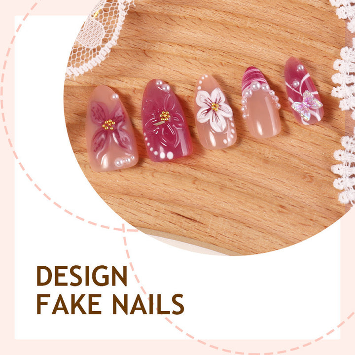 Kunstnagelset mit floralen Designs und 3D-Verzierungen Karnz
