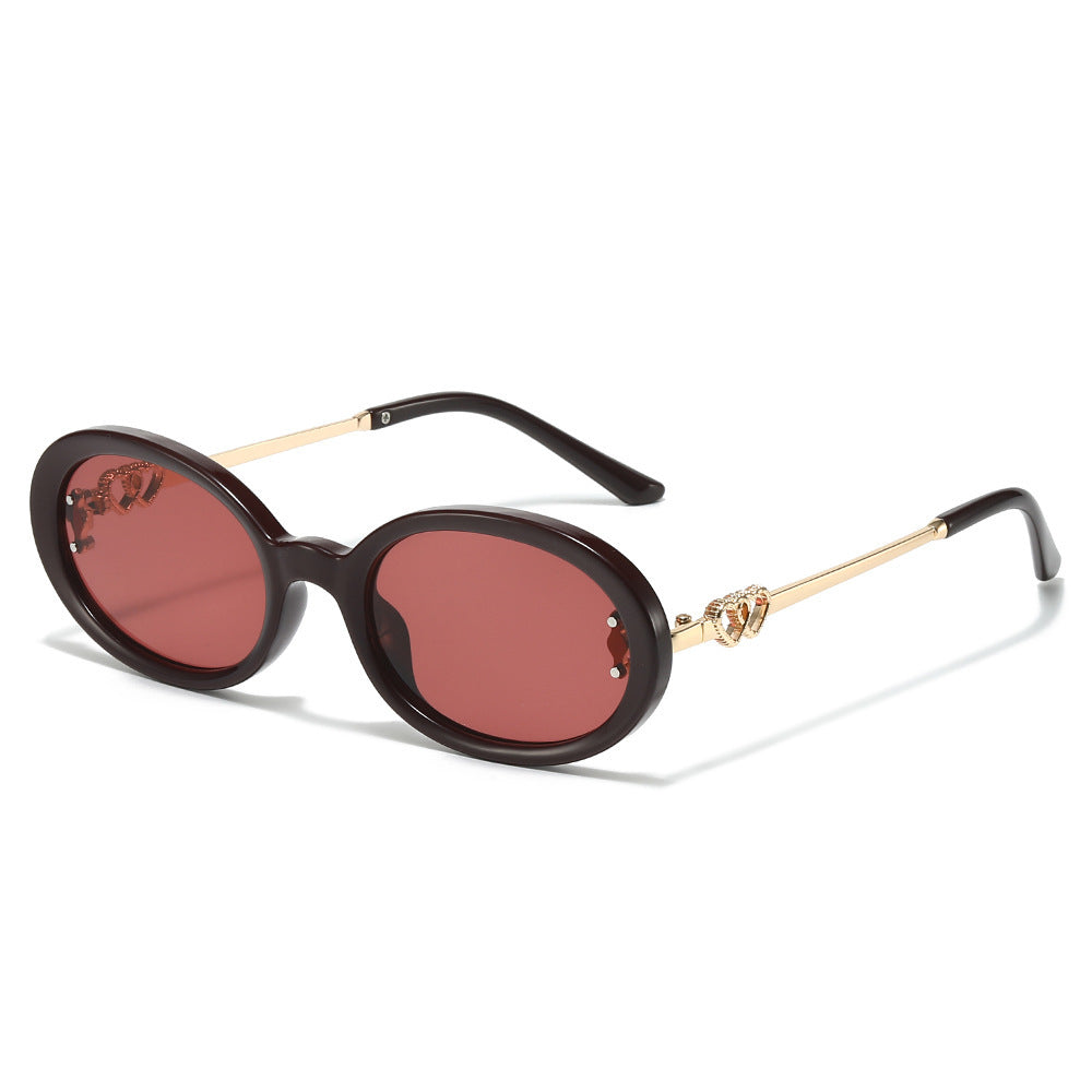 Elegante Shield Sonnenbrille mit dekorativen Metalldetails Karnz