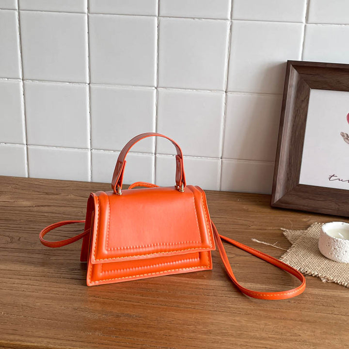 Strukturierte Mini-Crossbody-Handtasche