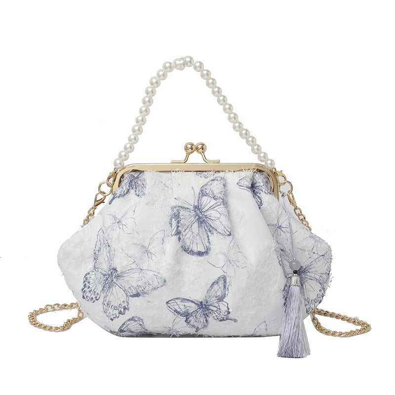 Elegante Clutch mit floralem Motiv