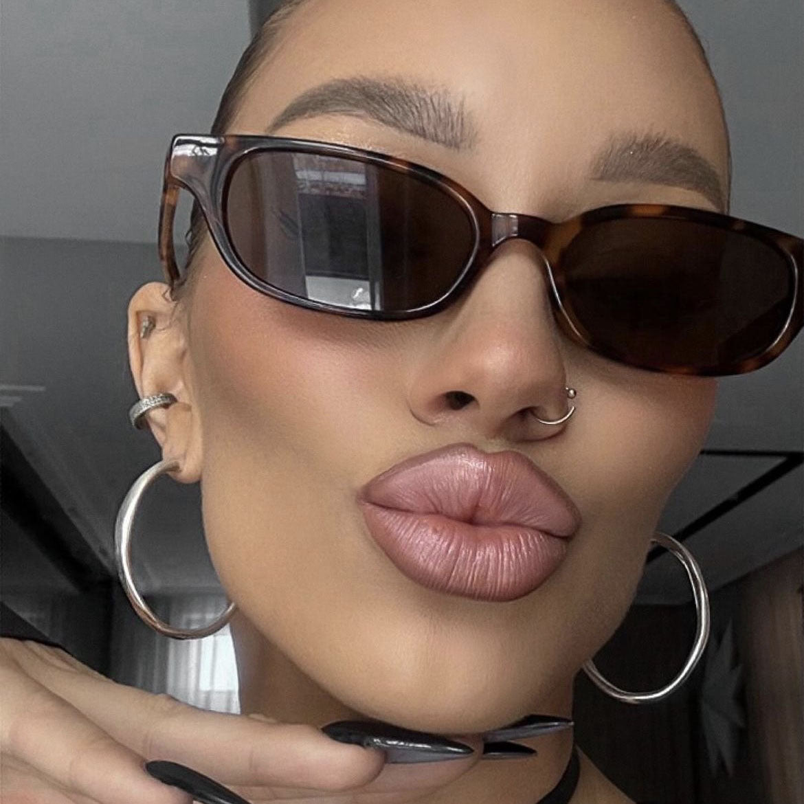 Damen modische Cat-Eye Sonnenbrille mit UV-Schutz und leichtem Rahmen Karnz