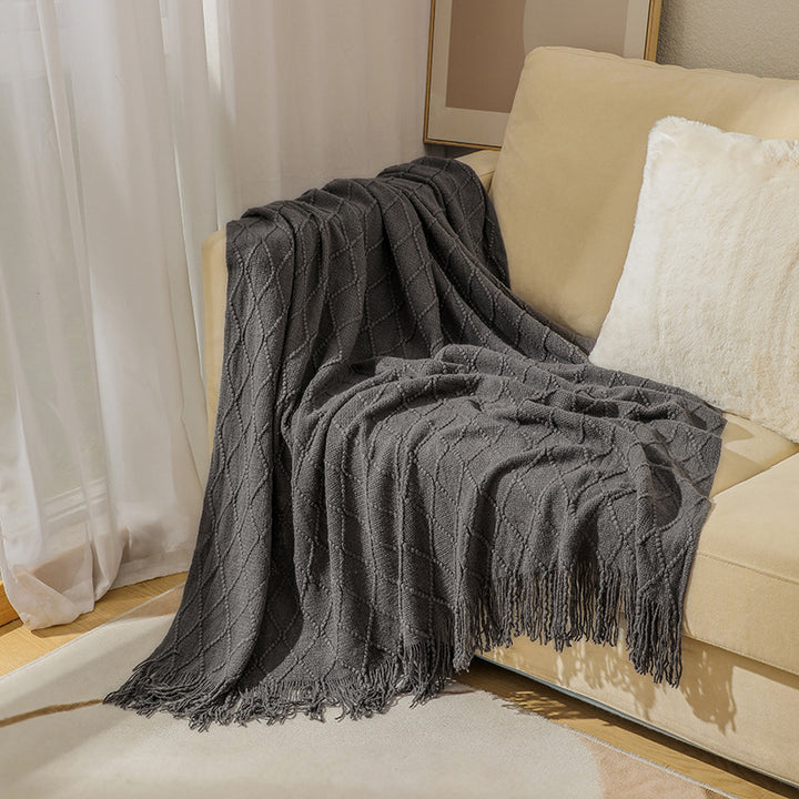 Gemütliche strukturierte gestrickte Wurfdecke