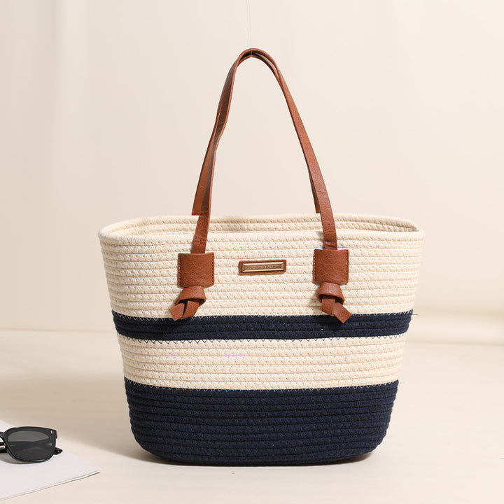 Damen Handtasche aus strukturiertem Naturmaterial mit braunen Lederriemen Karnz