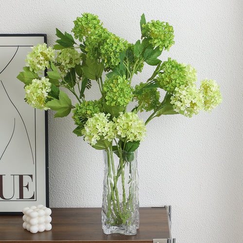 Künstlicher Hydrangeazweig mit lebhaften Blüten und detailreichen Blättern Karnz