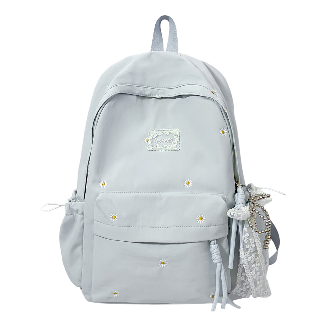 Stylischer backpack mit floralem Schmuck Karnz