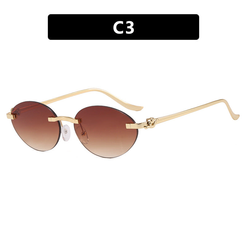 Damen elegante ovale Sonnenbrille mit goldenen Akzenten Karnz