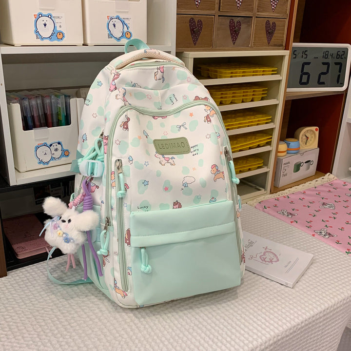 Verspielt illustrierter Schulrucksack