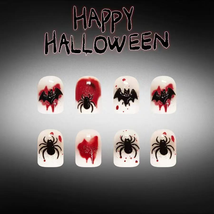 Halloween Kunstnagelset mit stilvollen Spinnennetz- und Vampirdesigns Karnz
