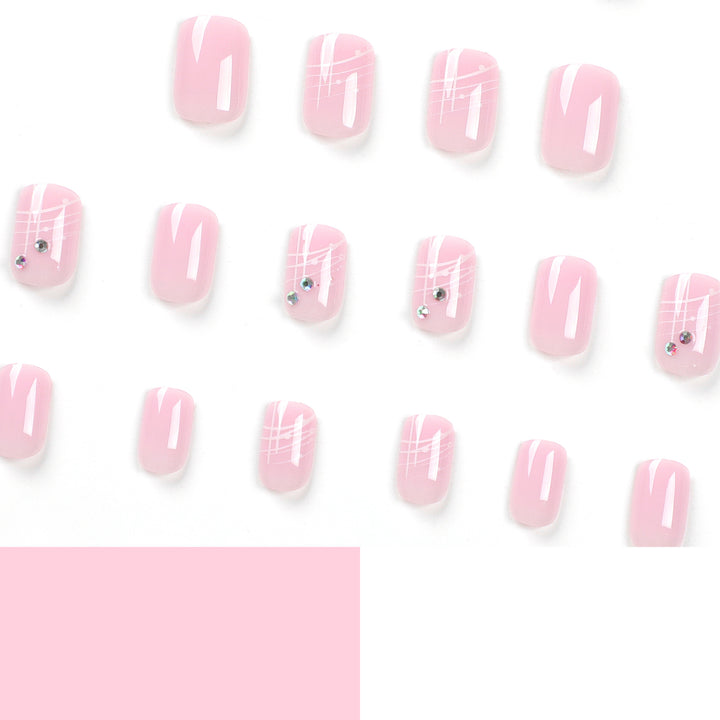 Kunstvolle Nagelverlängerungen mit elegantem Design und Strassverzierungen Karnz