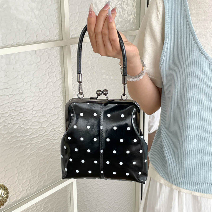 Stylische Pünktchen-Handtasche