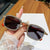 Damen Sonnenbrille mit strassbesetztem Rahmen und modernem Holzdesign Karnz