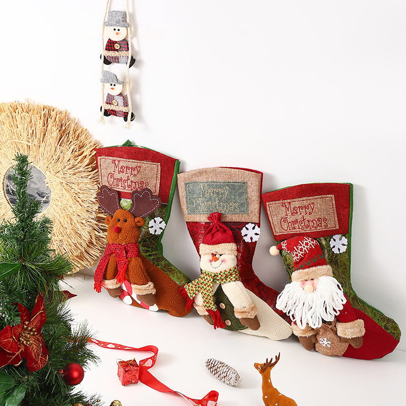 Festlicher Weihnachtsstrumpf mit liebevollen Santa-Motiven Karnz