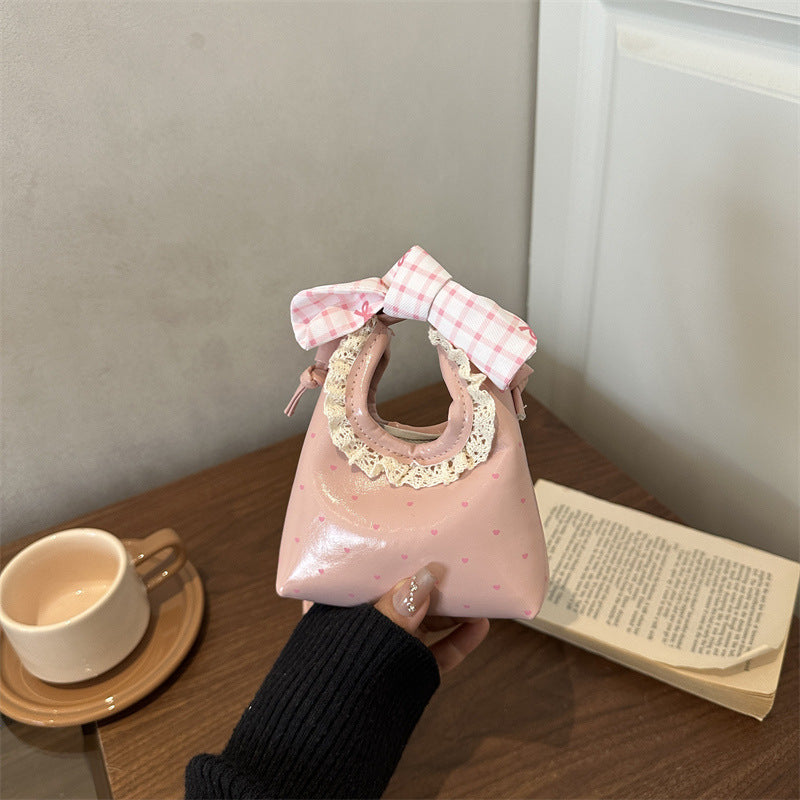 Charmante Mini-Handtasche mit Schleifenakzent