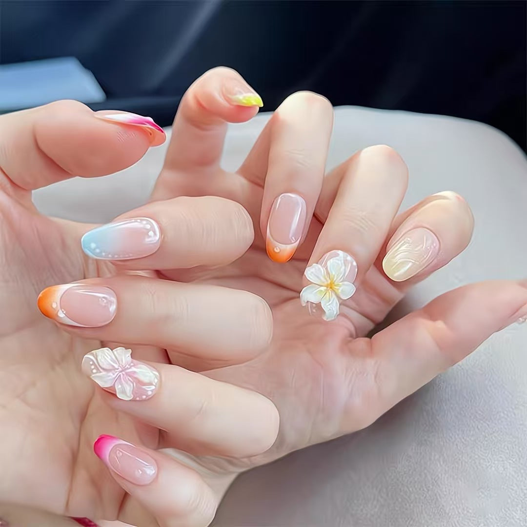 Künstlerisches Press-On-Nagelset mit floralen und Ombré-Designs Karnz