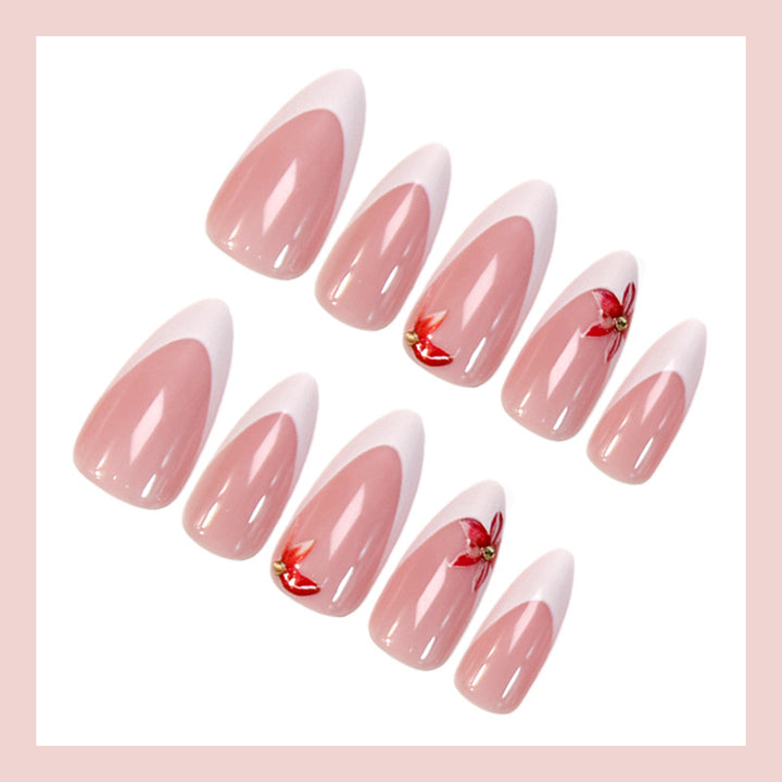 Kunstnagelset mit elegantem französischen Design und charmanten Blumenakzenten Karnz