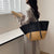 Damen Elegante Handtasche aus geflochtenem Naturmaterial mit luxuriösen Ledergriffen Karnz
