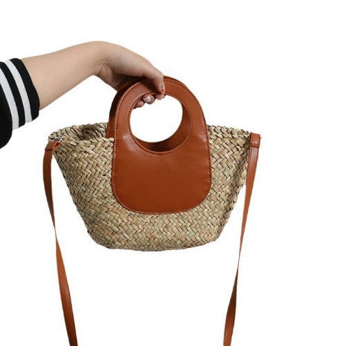 Damen Handtasche aus geflochtenem Material mit Lederdetails Karnz