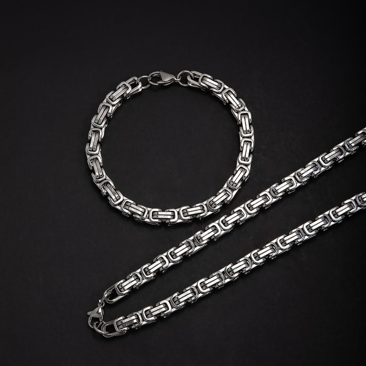 Elegantes ineinandergreifendes Kettenhalsketten- und Armbandset Karnz