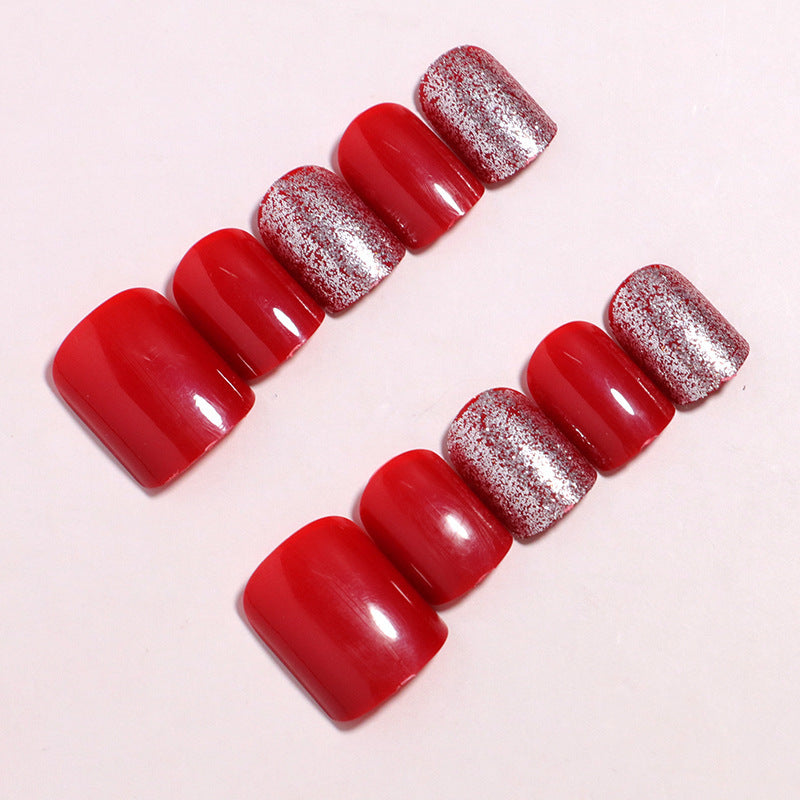 Dekoratives Press-On Nagelset mit Glitzerakzenten Karnz