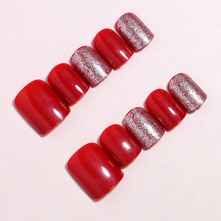 Dekoratives Press-On Nagelset mit Glitzerakzenten Karnz