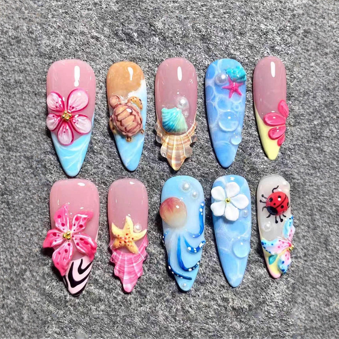 Künstlerisch vom Ozean inspiriertes Nagelkunst-Enhancements Karnz